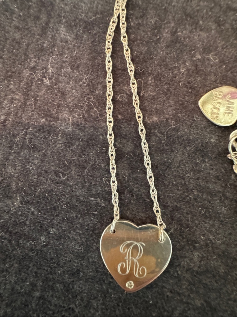 Sterling silver and diamond heart necklace.